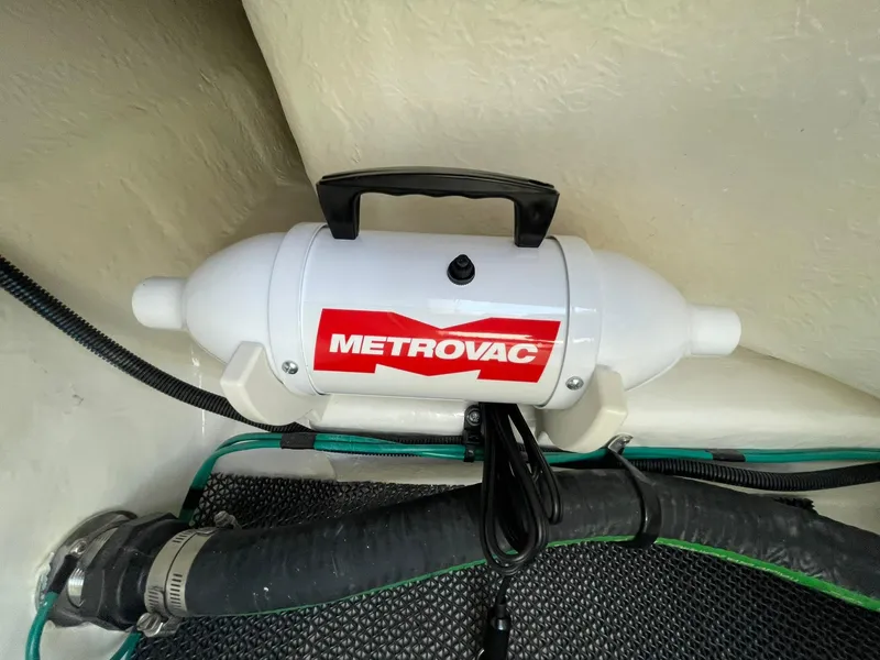 Slide: The Image of MetroVac device installed in 2025 Chaparral 270 OSX boat interior. - 38