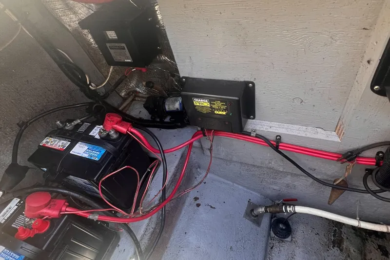 Slide: The Image of Battery and wiring setup in a 1998 Chaparral 270 Signature boat. - 28