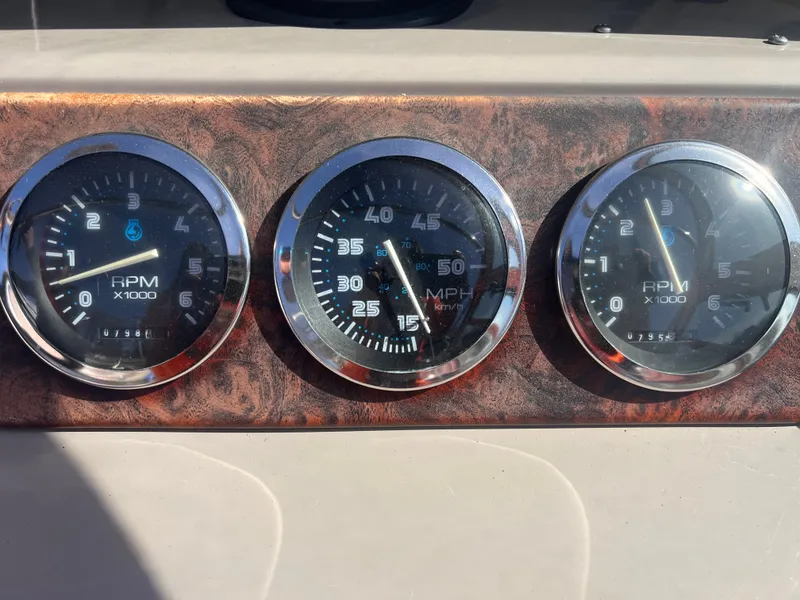 Slide: The Image of Dashboard gauges of a 1998 Chaparral 270 Signature boat. - 7