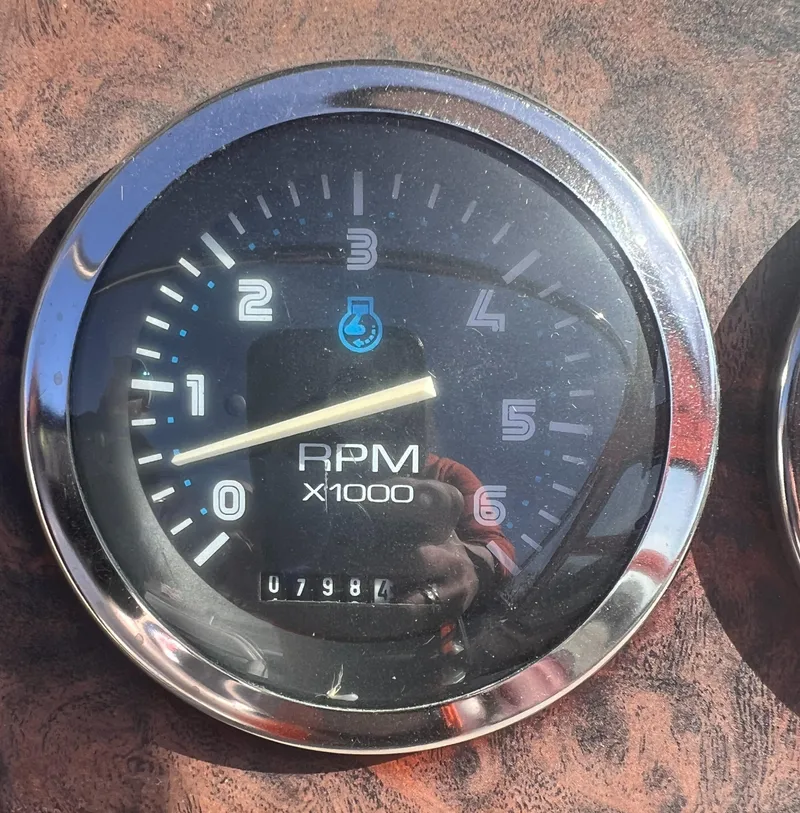 Slide: The Image of Tachometer of 1998 Chaparral 270 Signature boat showing RPM and hour reading. - 8