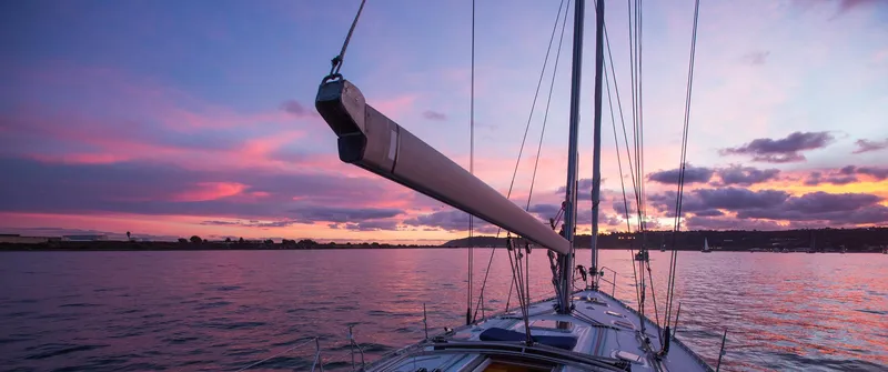 Slide: The Image of Sailing at sunset on a 2002 Jeanneau Sun Odyssey 45.2 yacht. - 12