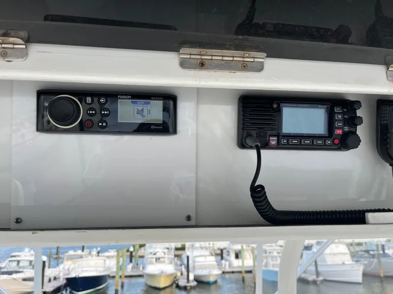 Slide: The Image of Control panel of a 1995 Hatteras 45 Convertible boat with marine electronics. - 9