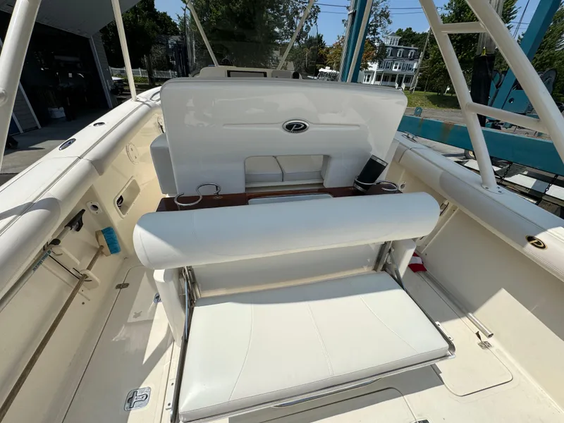Slide: The Image of 2014 Pursuit S 280 Sport boat interior with seating and storage. - 1