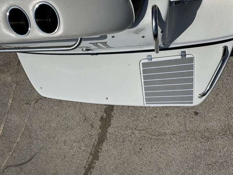 Slide: The Image of 2003 Crownline 262 CR boat deck with ventilation and metal handle. - 7