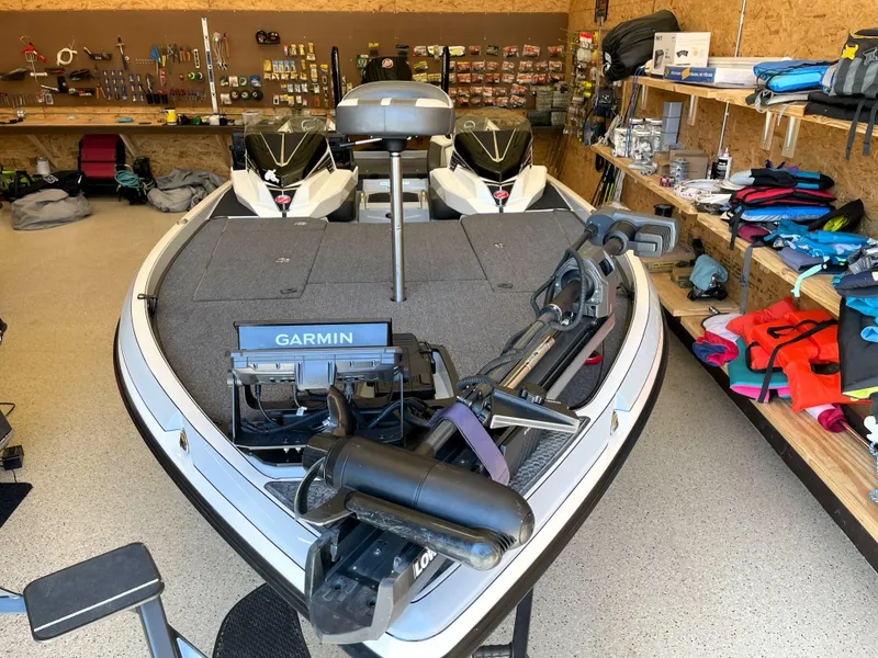 Slide: The Image of 2023 Ranger Z520R 55th Anniversary Limited Edition boat with Garmin equipment in a workshop. - 17