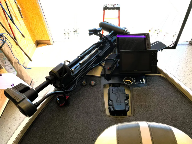 Slide: The Image of 2023 Ranger Z520R 55th Anniversary boat interior with advanced navigation equipment. - 19