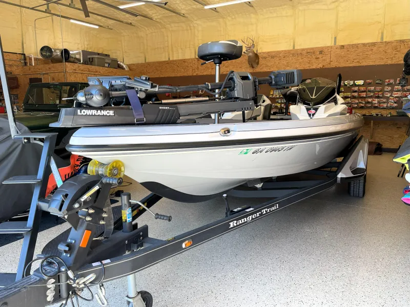 Slide: The Image of 2023 Ranger Z520R 55th Anniversary Limited Edition boat on trailer in garage. - 3