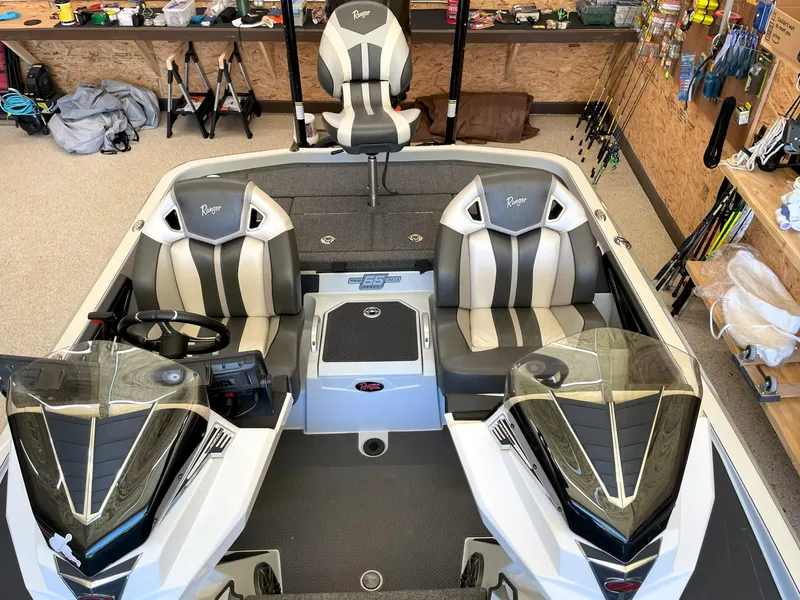 Slide: The Image of 2023 Ranger Z520R 55th Anniversary Limited Edition boat interior with seating and controls. - 33
