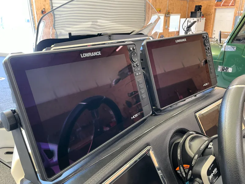 Slide: The Image of Dual Lowrance HDS displays on 2023 Ranger Z520R 55th Anniversary Limited Edition boat dashboard. - 38