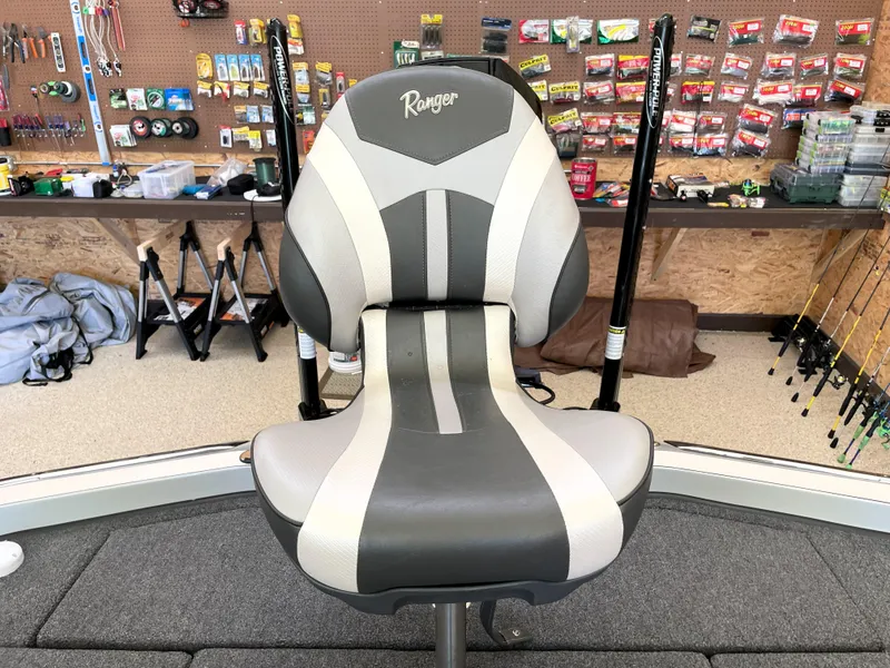 Slide: The Image of 2023 Ranger Z520R 55th Anniversary Limited Edition boat seat in a fishing store. - 45