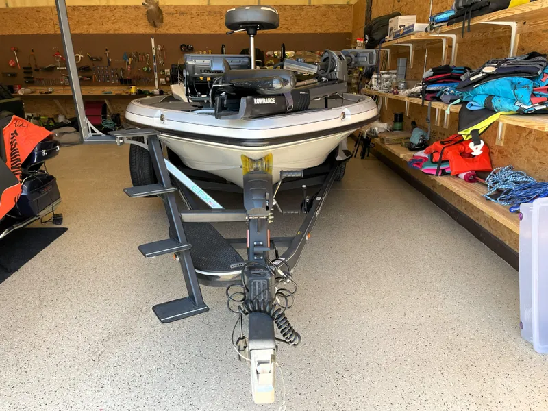 Slide: The Image of 2023 Ranger Z520R 55th Anniversary Limited Edition boat in a garage with equipment. - 5