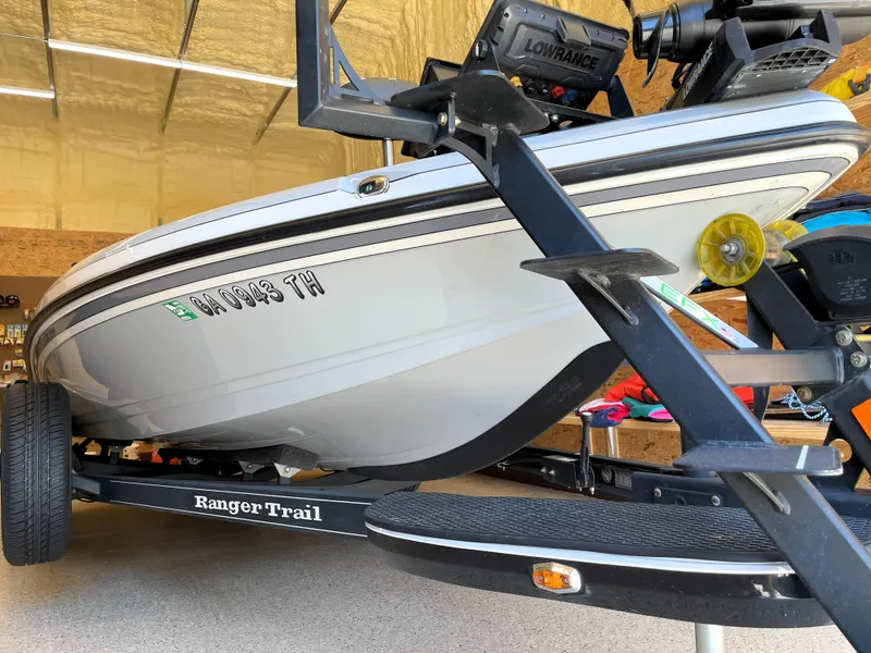 Slide: The Image of 2023 Ranger Z520R 55th Anniversary Limited Edition boat on trailer in garage. - 6