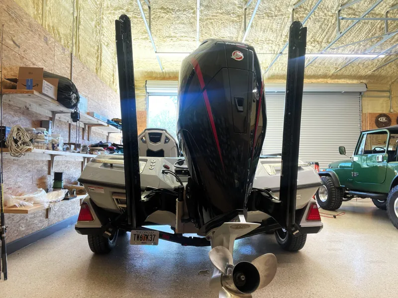 Slide: The Image of 2023 Ranger Z520R 55th Anniversary Limited Edition boat in a garage setting. - 8