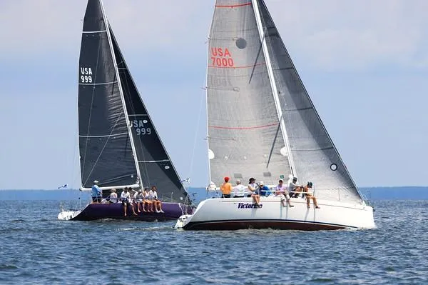 Slide: The Image of Sailboats racing on open water, Columbia 32 model, 2007. - 1