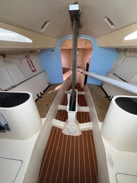 Slide: The Image of Interior of 2007 Columbia 32 sailboat, featuring spacious cabin and wooden flooring. - 15