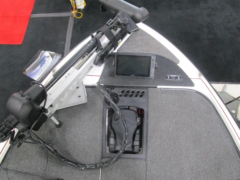 Slide: The Image of 2025 Nitro Z20 boat deck with trolling motor and electronic display. - 10