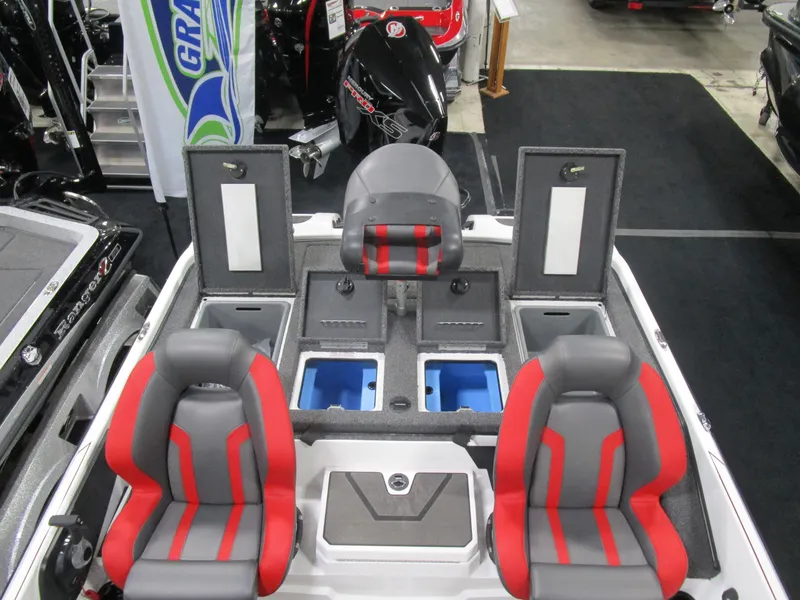 Slide: The Image of 2025 Nitro Z20 boat interior with red and gray seats, storage compartments, and modern design. - 11