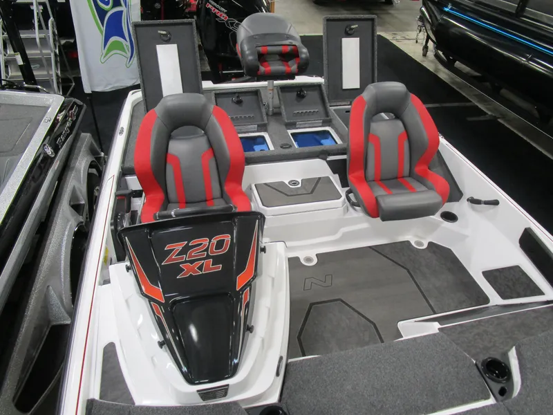 Slide: The Image of 2025 Nitro Z20 boat interior with red and gray seats, featuring Z20 XL branding. - 12