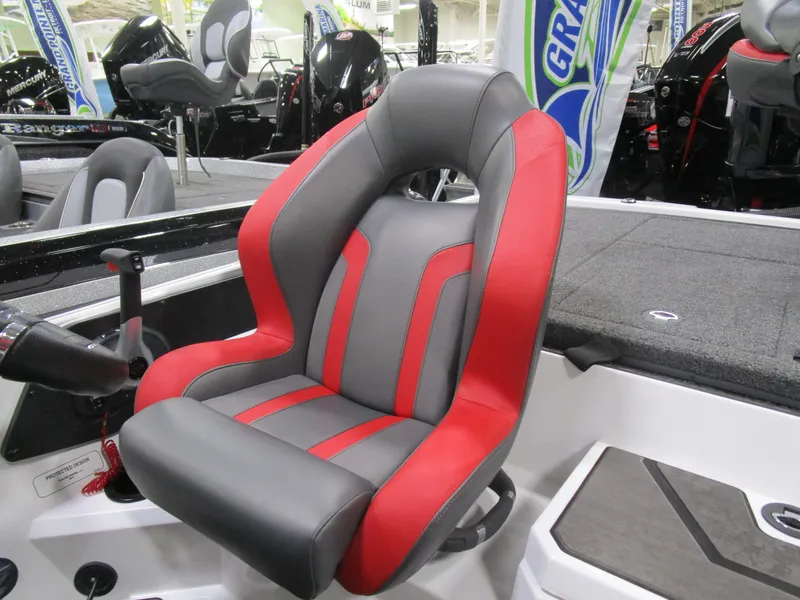 Slide: The Image of Red and gray seat in 2025 Nitro Z20 boat interior. - 13