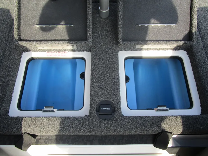 Slide: The Image of 2025 Nitro Z20 XL Pro boat storage compartments with pump-out feature. - 23
