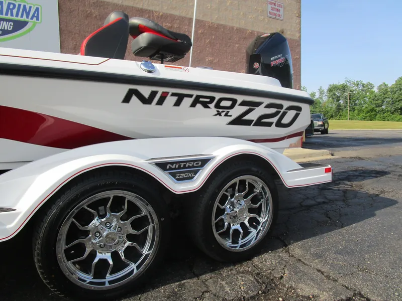 Slide: The Image of 2025 Nitro Z20 XL Pro boat with sleek design and chrome wheels. - 4