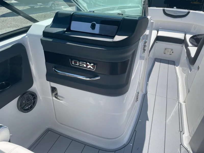Slide: The Image of 2024 Chaparral 250 OSX boat interior, featuring sleek design and modern amenities. - 31