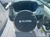 Slide: The Image of 2024 Chaparral 250 OSX boat dashboard with covered steering wheel. - 24