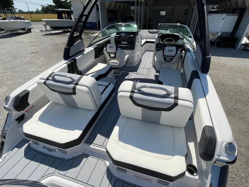 Slide: The Image of 2024 Chaparral 250 OSX boat interior with luxurious seating and modern design. - 39