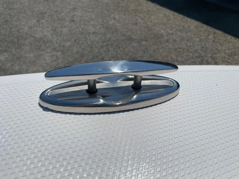 Slide: The Image of Chrome cleat on 2024 Chaparral 250 OSX boat deck. - 6