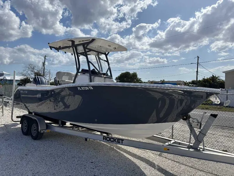 Slide: The Image of 2022 Sea Fox 248 Commander boat on trailer under cloudy sky. - 5