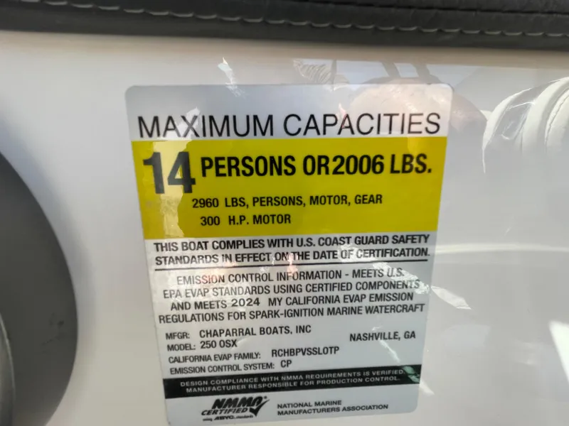 Slide: The Image of 2024 Chaparral 250 OSX capacity label: 14 persons, 2006 lbs, 2960 lbs total, 300 HP motor. - 27