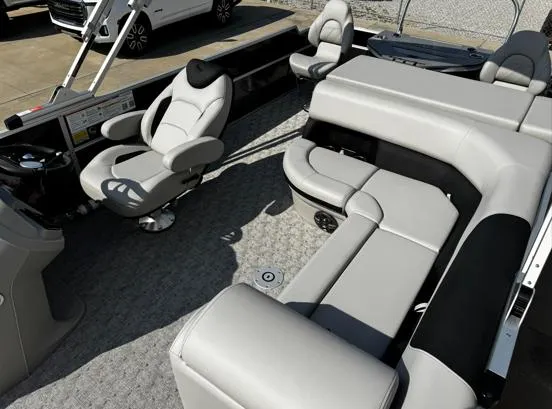 Slide: The Image of 2025 South Bay 224FCR LE pontoon boat interior with plush seating and modern design. - 4