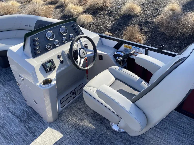 Slide: The Image of 2023 Viaggio Lago U L20U boat cockpit with modern steering and control panel. - 11
