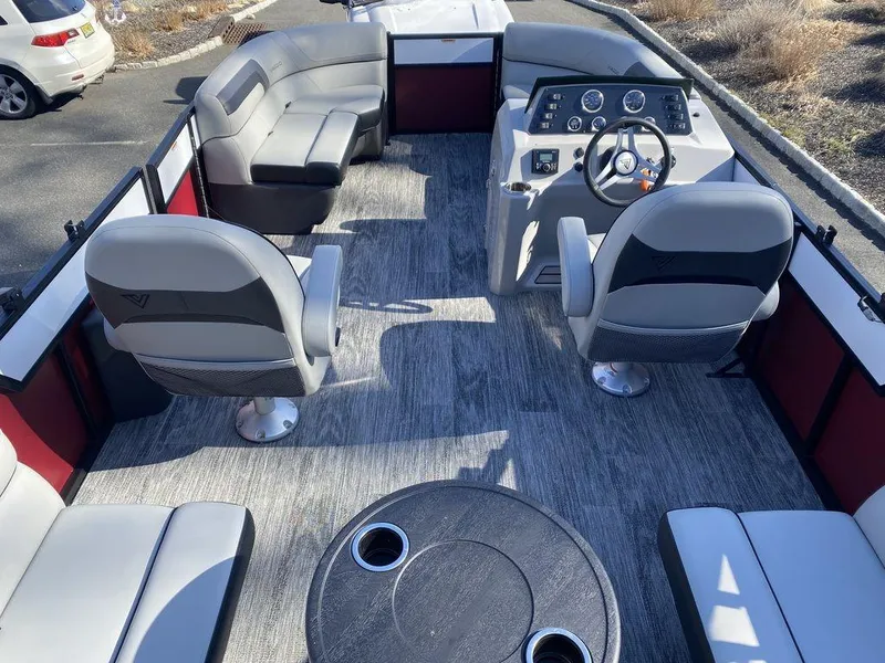 Slide: The Image of 2023 Viaggio Lago U L20U boat interior with seating, steering console, and table. - 8