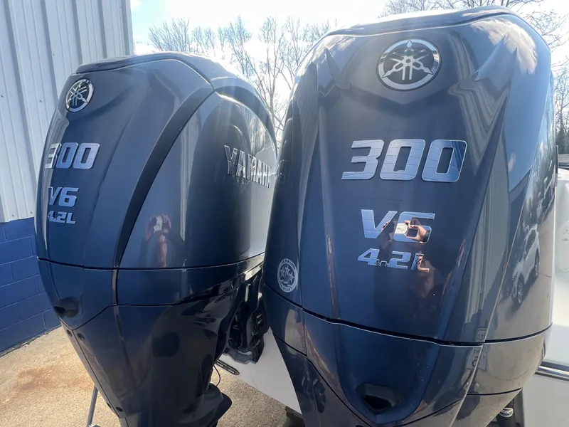 Slide: The Image of Twin Yamaha 300 V6 outboard engines on a 2025 Cobia 285 Open Center Console boat. - 4