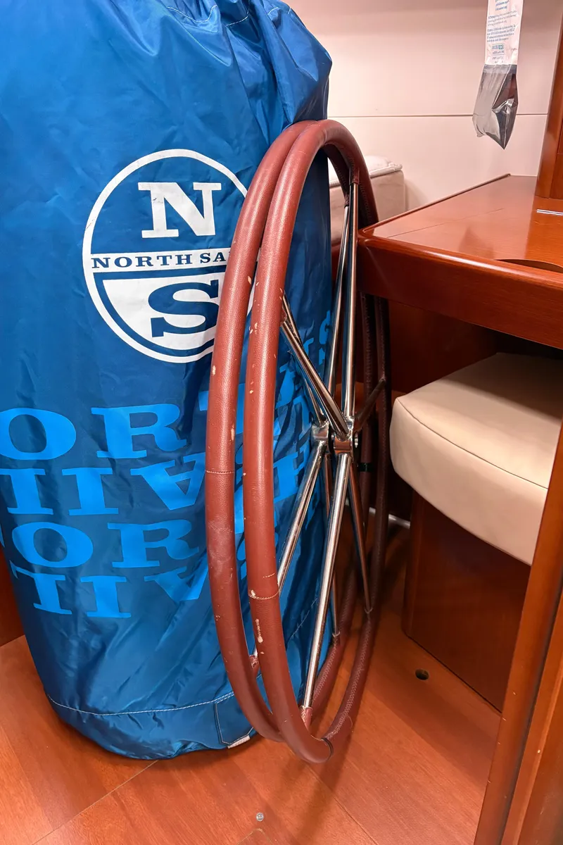 Slide: The Image of Beneteau Oceanis 40 sailboat wheel and North Sails bag, 2011 model. - 15