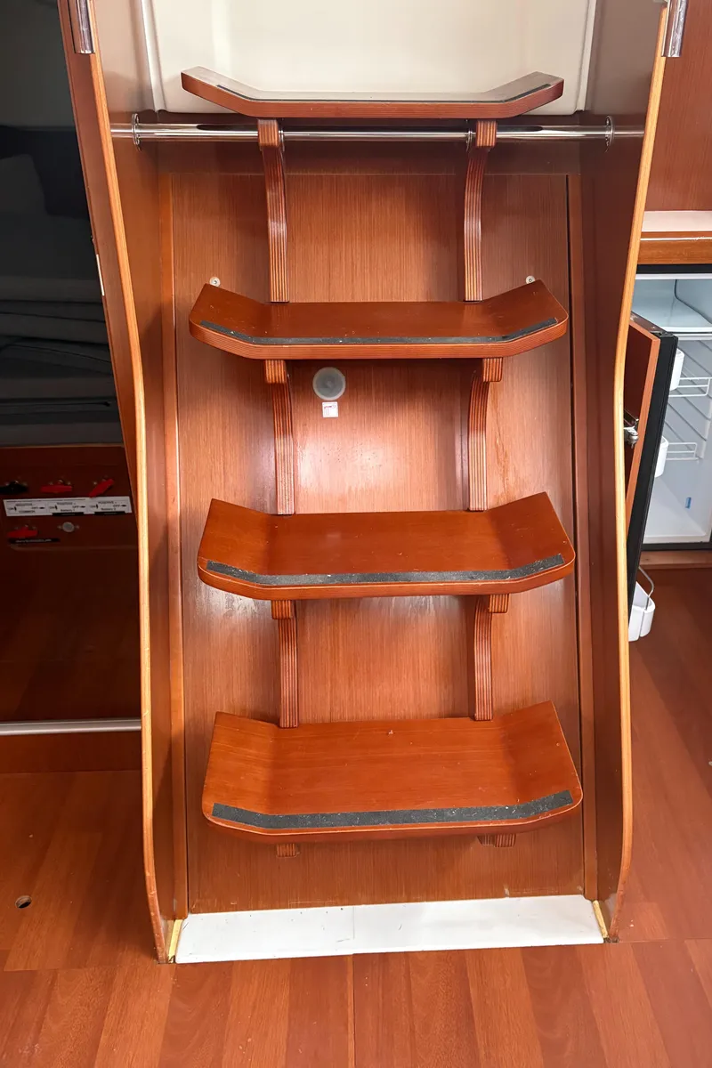 Slide: The Image of Wooden interior stairs of a 2011 Beneteau Oceanis 40 sailboat. - 8