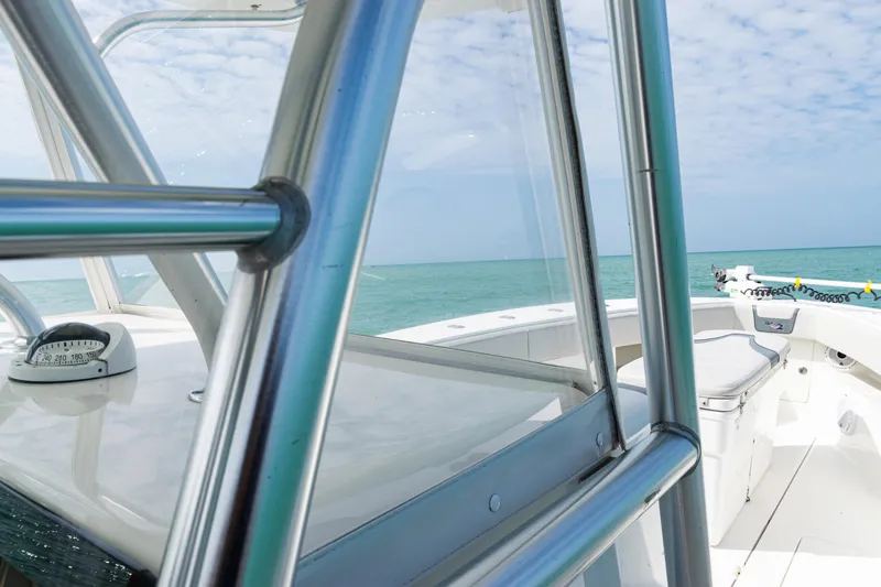 Slide: The Image of 2015 SeaVee 390Z boat deck with ocean view and stainless steel railings. - 42