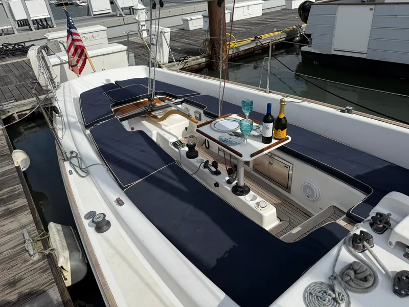 Slide: The Image of 2009 e Sailing Yachts e33 with elegant deck setup, docked at marina. - 12