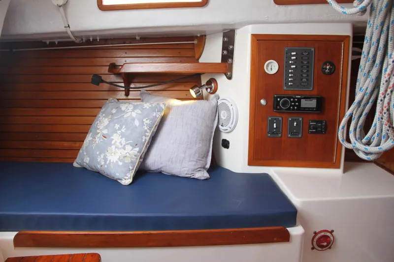 Slide: The Image of Interior of 2009 e Sailing Yachts e33 with cushions and control panel. - 26