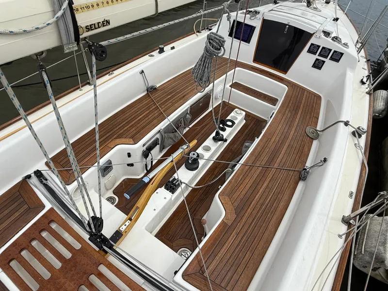 Slide: The Image of 2009 e Sailing Yachts e33 sailboat with teak deck and modern cockpit design. - 8