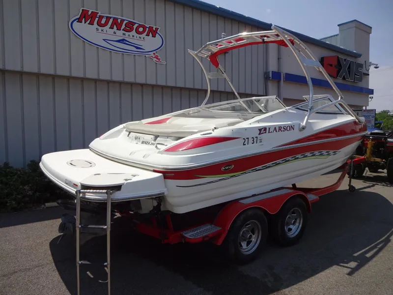 Slide: The Image of 2007 Larson 206 Senza boat on trailer at Munson Ski & Marine dealership. - 3