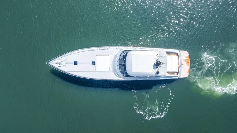 Slide: The Image of Aerial view of 2003 Baia PANTHER 80 yacht cruising on water. - 11
