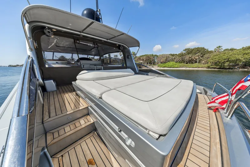 Slide: The Image of Luxury 2003 Baia Panther 80 yacht with spacious deck and sunbathing area. - 18