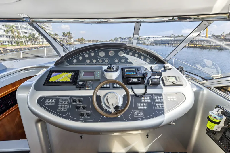 Slide: The Image of Control panel of 2003 Baia Panther 80 yacht with navigation and communication equipment. - 34