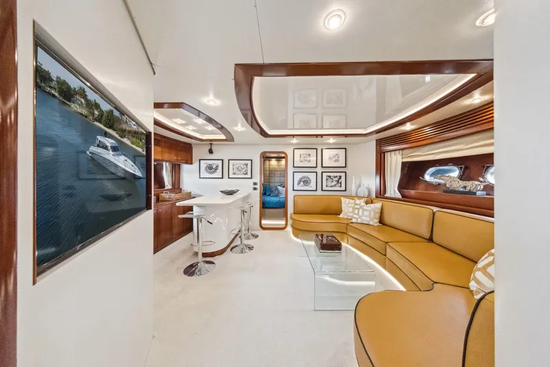 Slide: The Image of Luxurious interior of 2003 Baia PANTHER 80 yacht with modern decor and comfortable seating. - 39