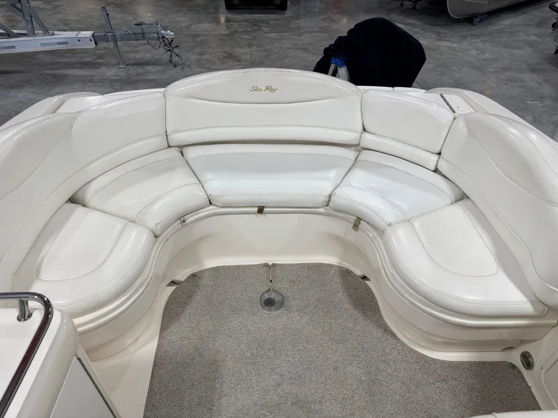 Slide: The Image of White leather seating on a 2000 Sea Ray 280 BR boat. - 8