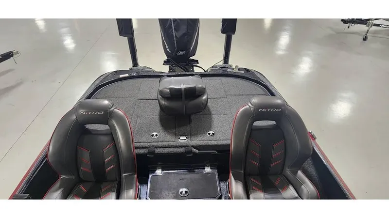 Slide: The Image of 2019 Nitro Z20 boat interior with dual seats and storage compartments. - 13