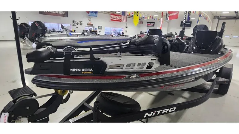 Slide: The Image of 2019 Nitro Z20 fishing boat with Minn Kota Fortrex motor in showroom. - 4