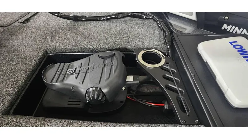 Slide: The Image of 2019 Nitro Z20 boat compartment with Minn Kota trolling motor and Lowrance electronics. - 6